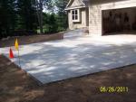 20' x 25' Apron with a 24' x 6' sidewalk to the front entrance